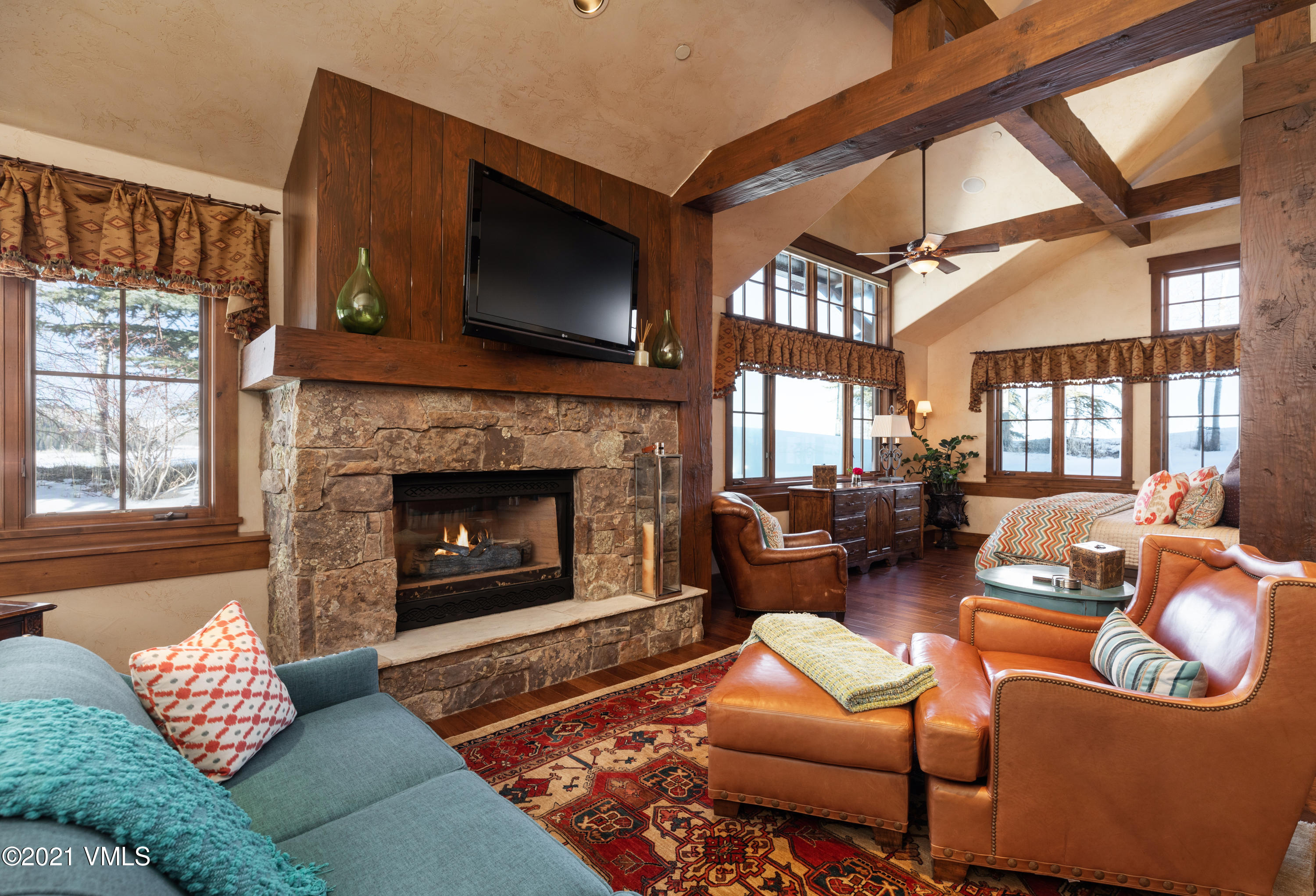 1092 Summit Trail Edwards, CO 81632 - Photo 12 of 48 a living room with furniture fireplace and flat screen tv