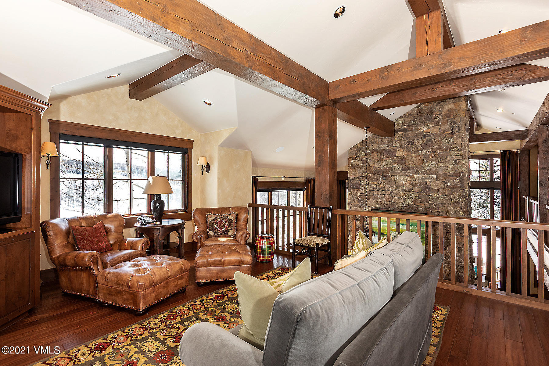 1092 Summit Trail Edwards, CO 81632 - Photo 22 of 48 a living room with furniture wooden floor and a large window