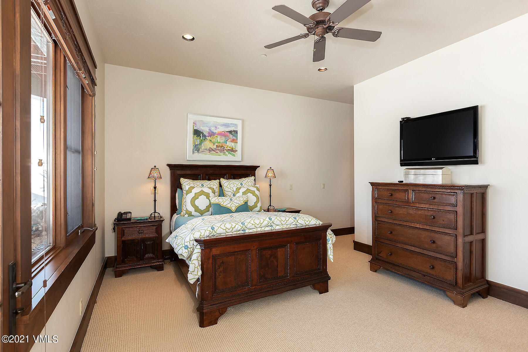 1092 Summit Trail Edwards, CO 81632 - Photo 30 of 48 a bedroom with a bed and a flat screen tv