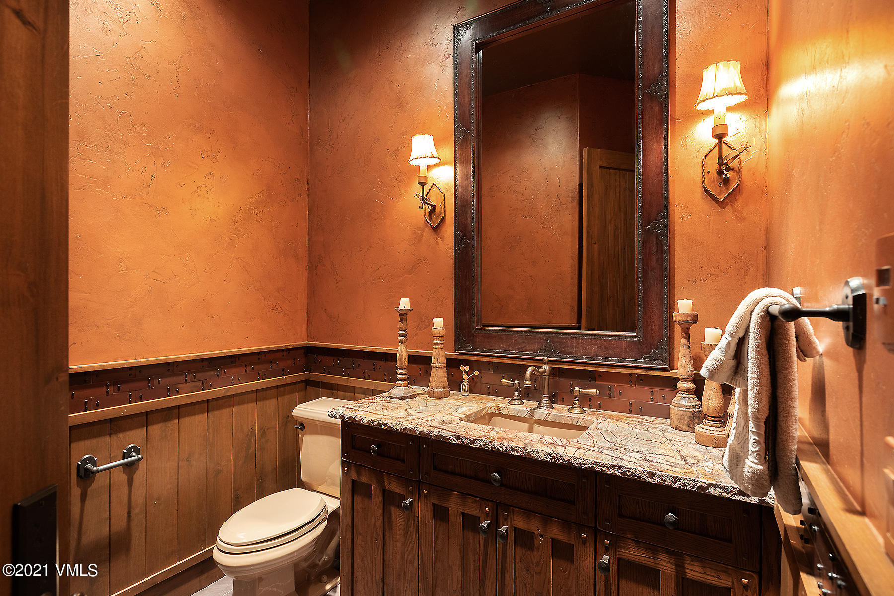 1092 Summit Trail Edwards, CO 81632 - Photo 33 of 48 a bathroom with a granite countertop sink a toilet and a mirror