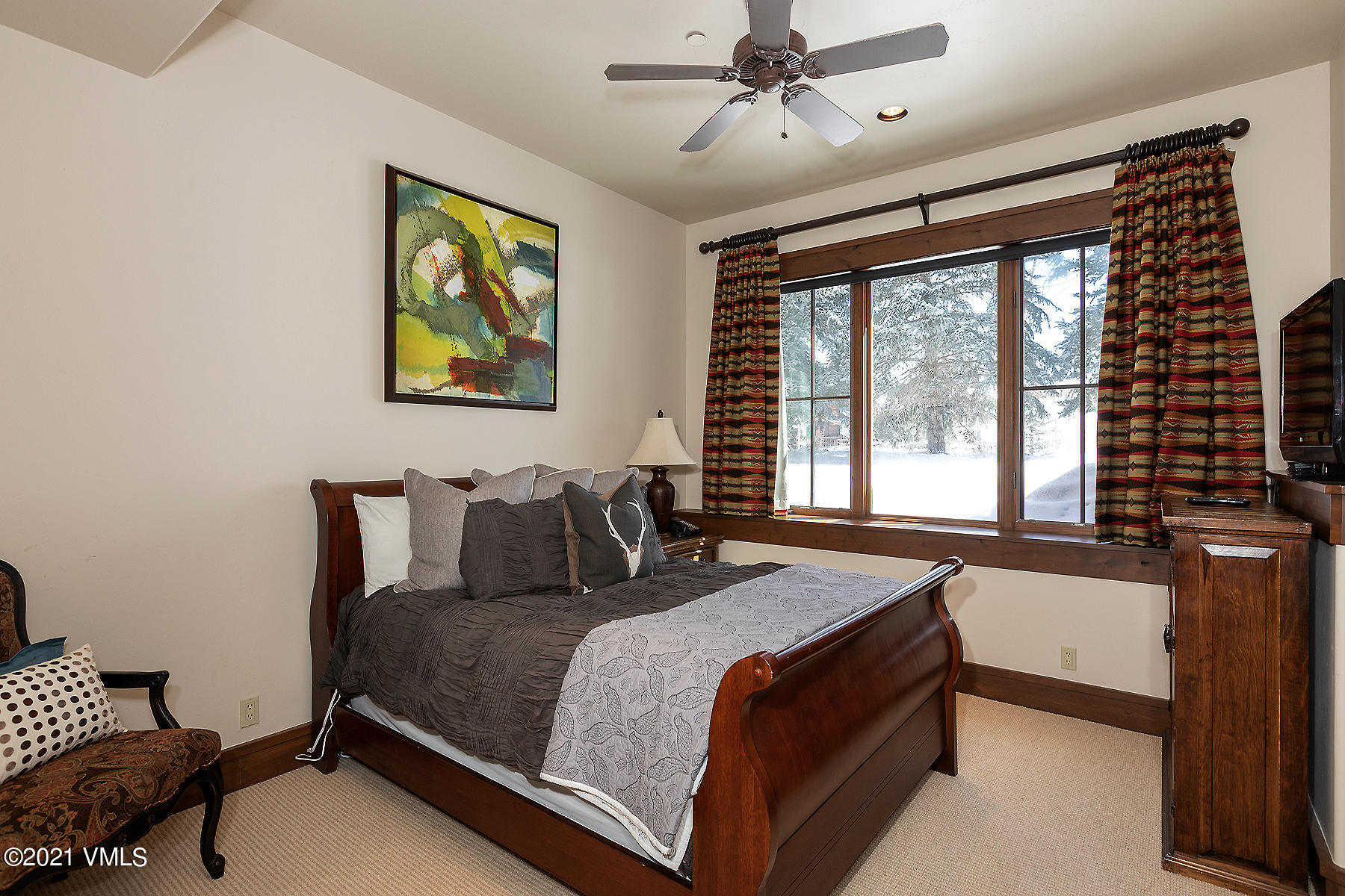 1092 Summit Trail Edwards, CO 81632 - Photo 34 of 48 a bedroom with a bed and wooden floor