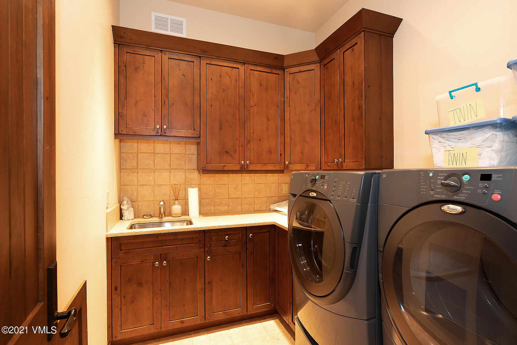 1092 Summit Trail Edwards, CO 81632 - Photo 38 of 48 a utility room with sink dryer and washer