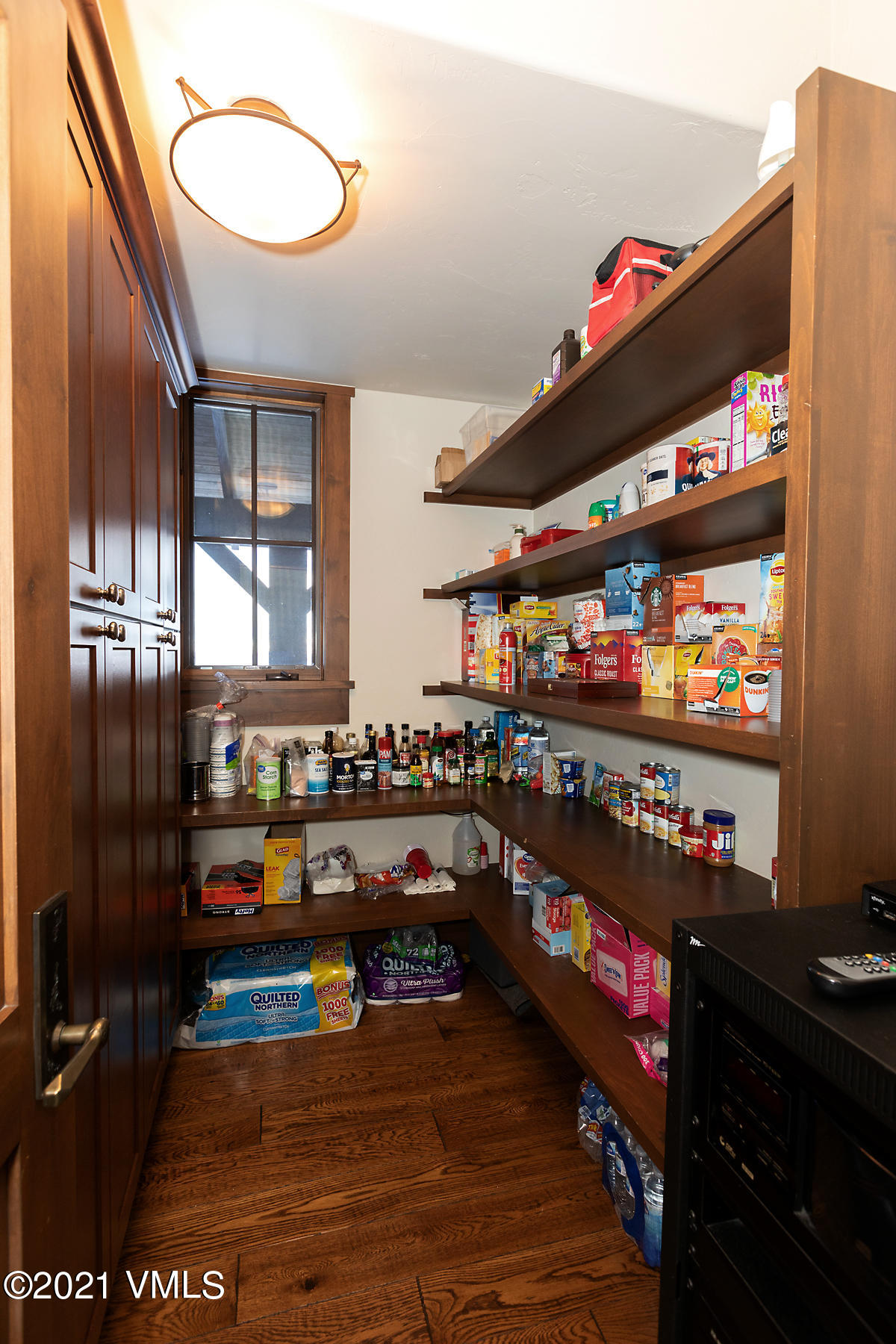 1092 Summit Trail Edwards, CO 81632 - Photo 39 of 48 a room with lots of wooden cabinets