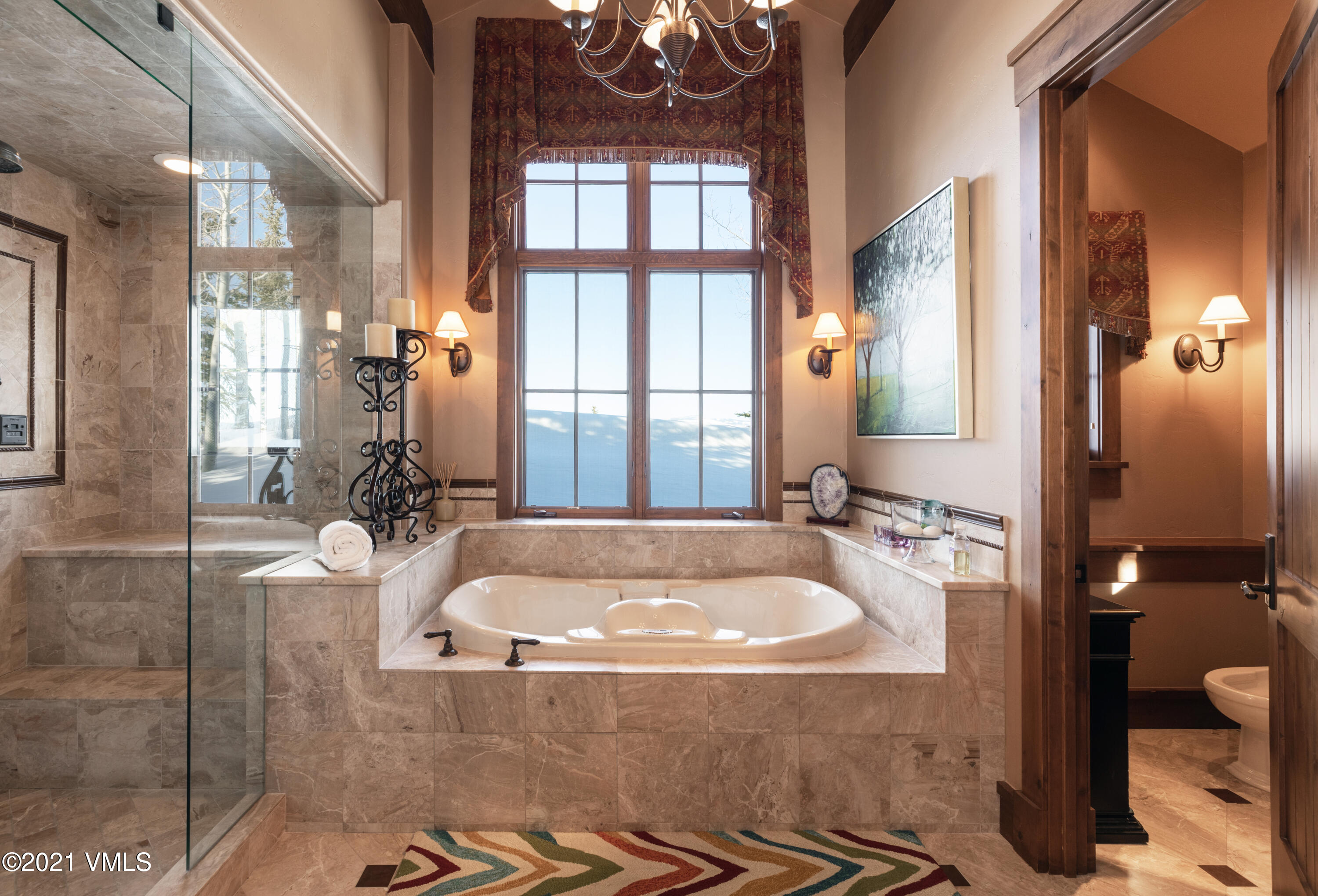 1092 Summit Trail Edwards, CO 81632 - Photo 46 of 48 a bath tub sitting in a bathroom next to a window