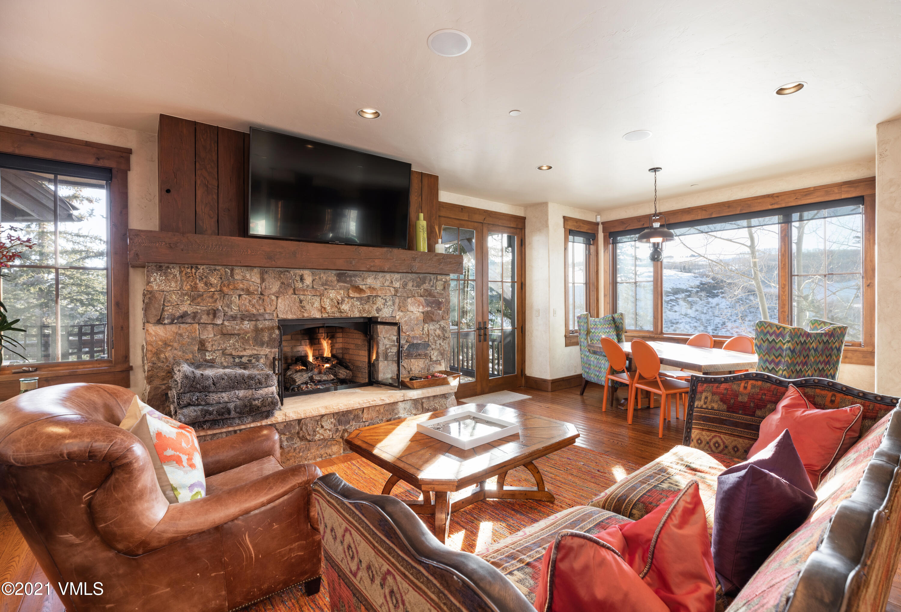 1092 Summit Trail Edwards, CO 81632 - Photo 47 of 48 a living room with furniture a large window and a fireplace