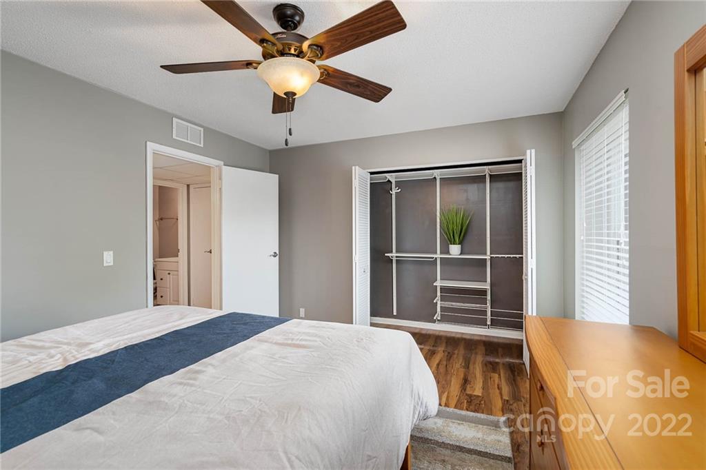 2612 Park Road, Unit D Charlotte, NC 28209 - Photo 11 of 23 a bedroom with a large bed and a large window