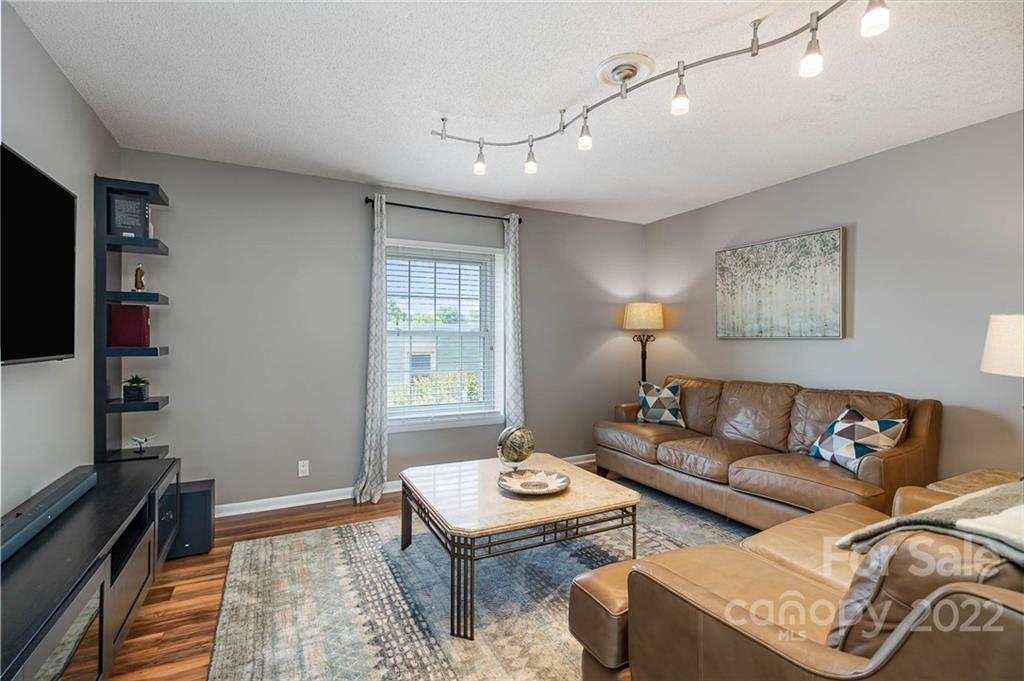 2612 Park Road, Unit D Charlotte, NC 28209 - Photo 4 of 23 a living room with furniture and a window