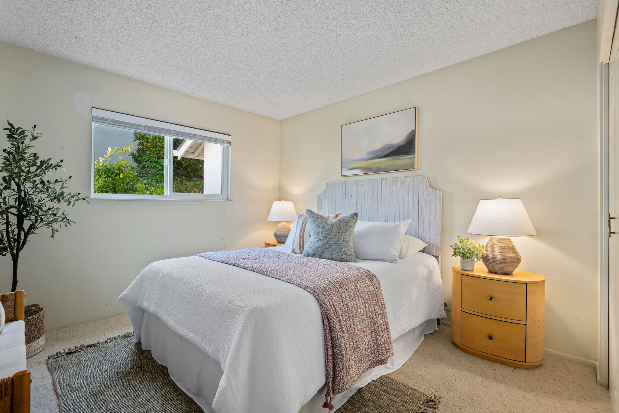 5984 Berkeley Road Goleta, CA 93117 - Photo 13 of 19 a bedroom with a bed and a window