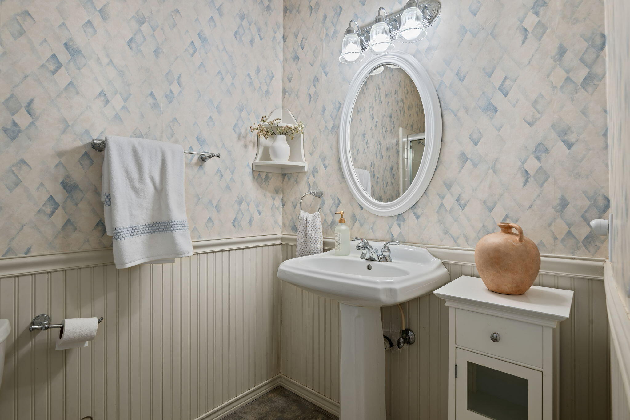 5984 Berkeley Road Goleta, CA 93117 - Photo 14 of 19 a bathroom with a sink and a mirror