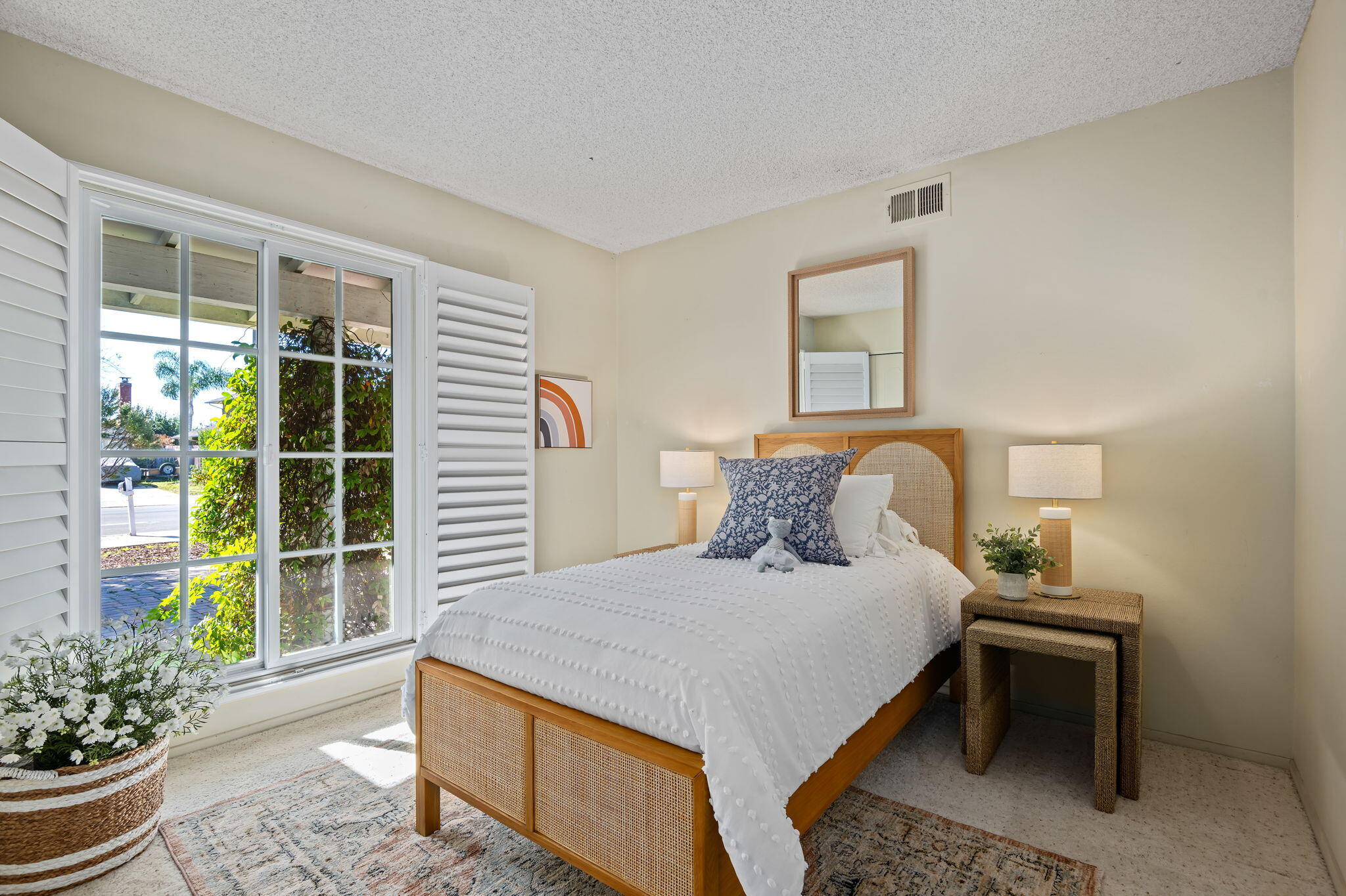 5984 Berkeley Road Goleta, CA 93117 - Photo 15 of 19 a bedroom with a bed and window