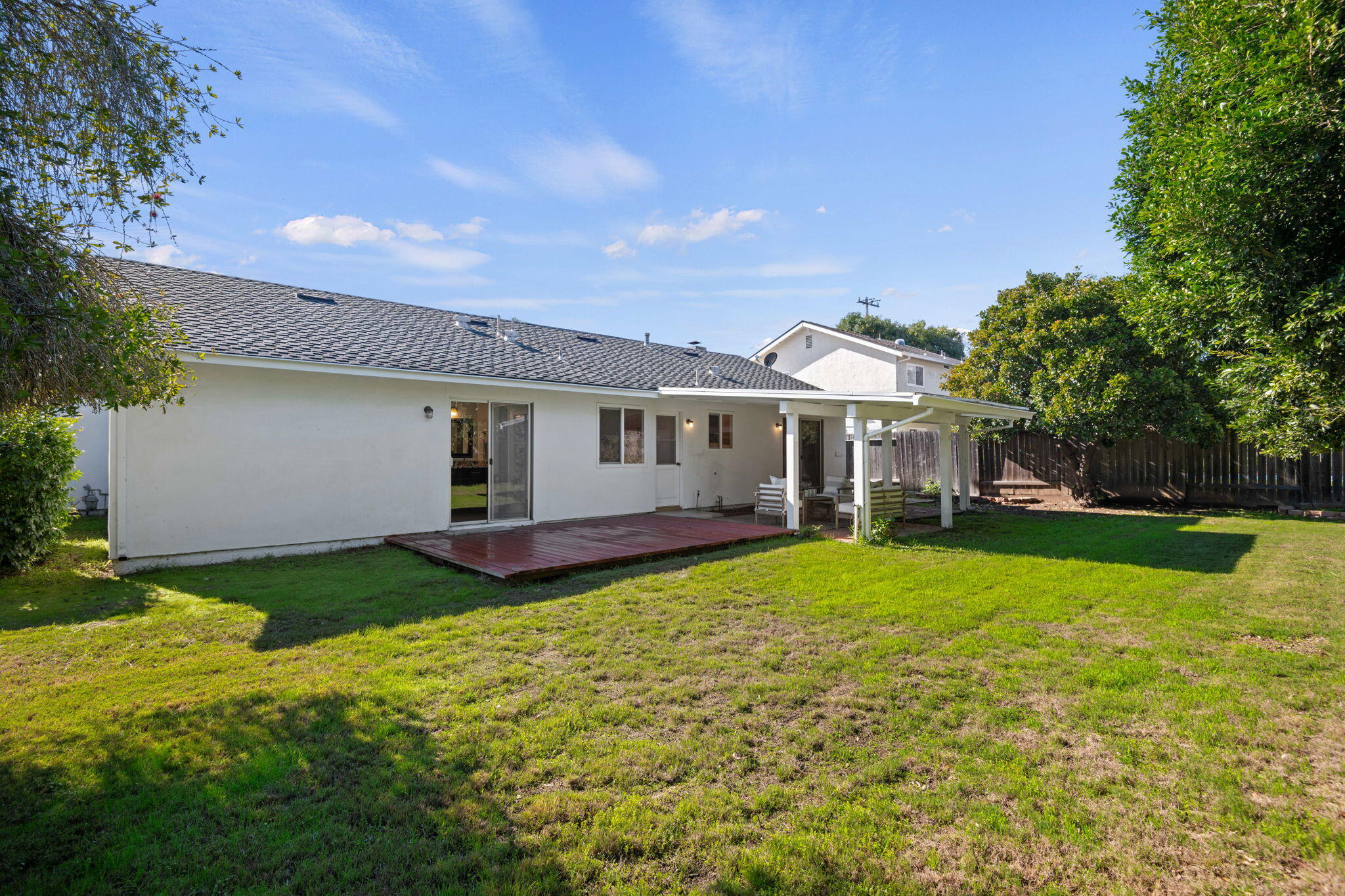 5984 Berkeley Road Goleta, CA 93117 - Photo 19 of 19 a view of a house with backyard and garden