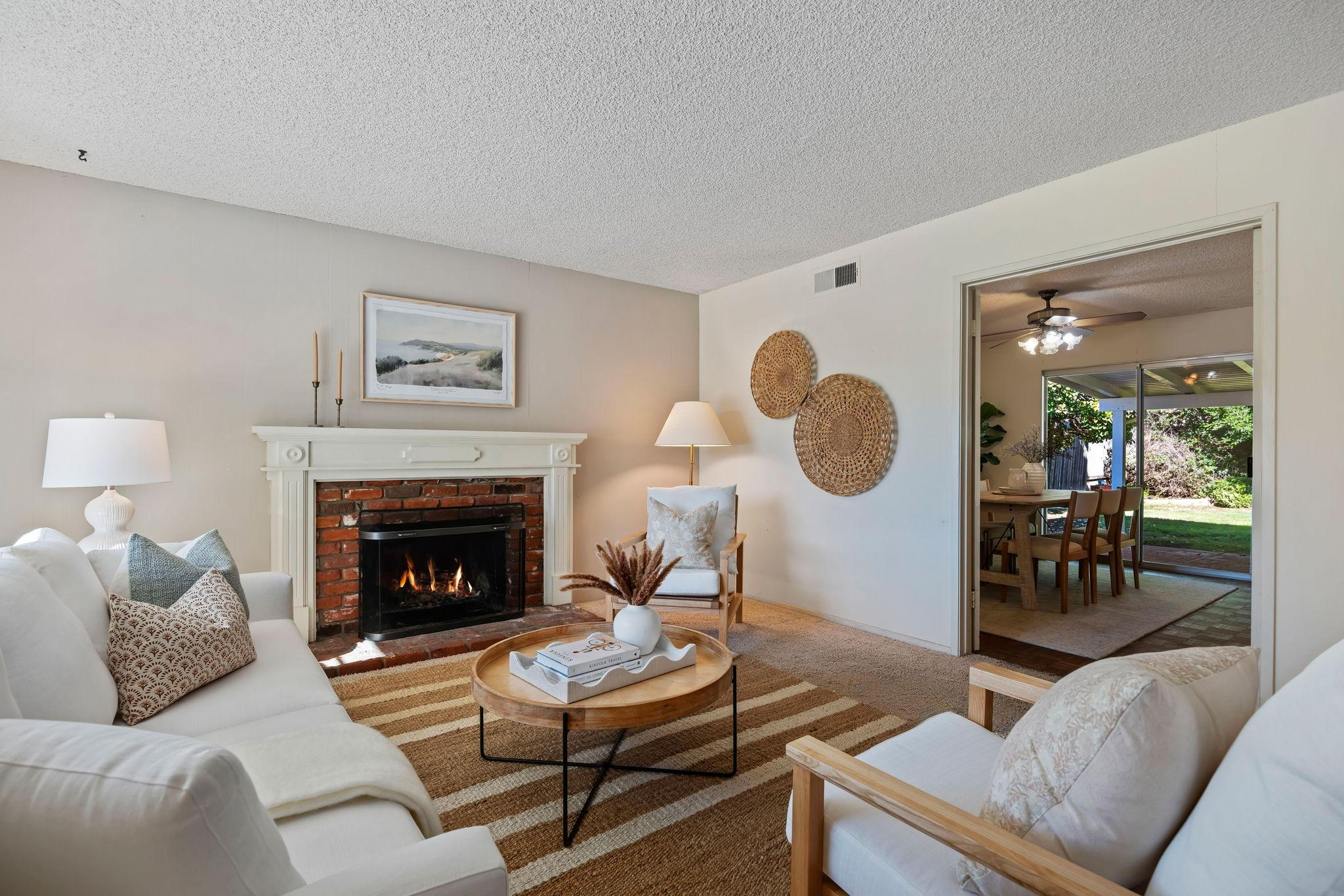 5984 Berkeley Road Goleta, CA 93117 - Photo 5 of 19 a living room with furniture and a fireplace