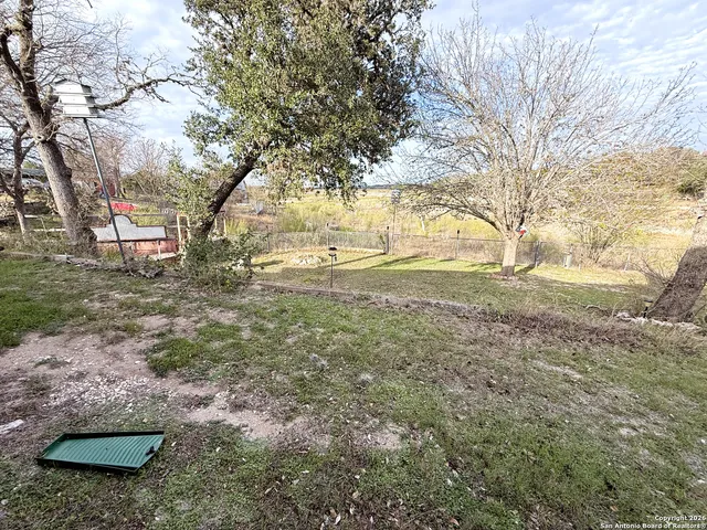 a view of yard with trees