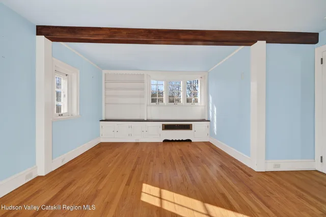 a bathroom with a sink mirror toilet and shower