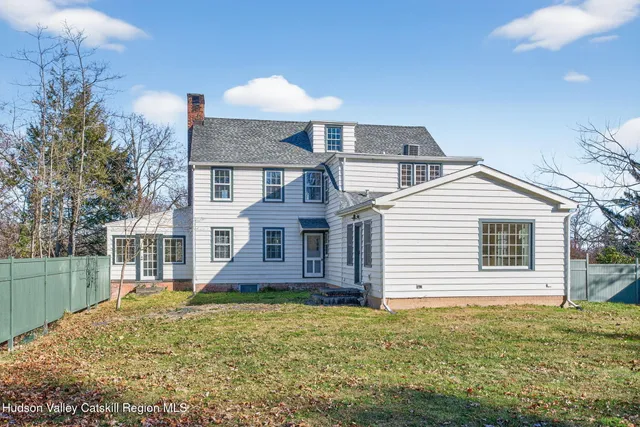 a view of a fountain in front of a house