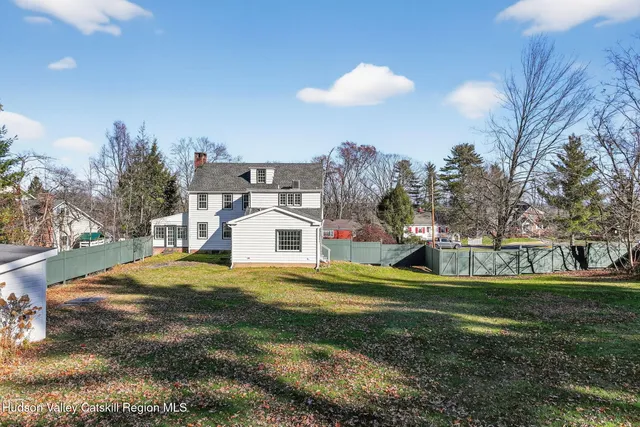 swimming pool view with a outdoor seating space