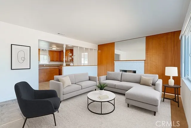 a living room with granite countertop furniture and a rug
