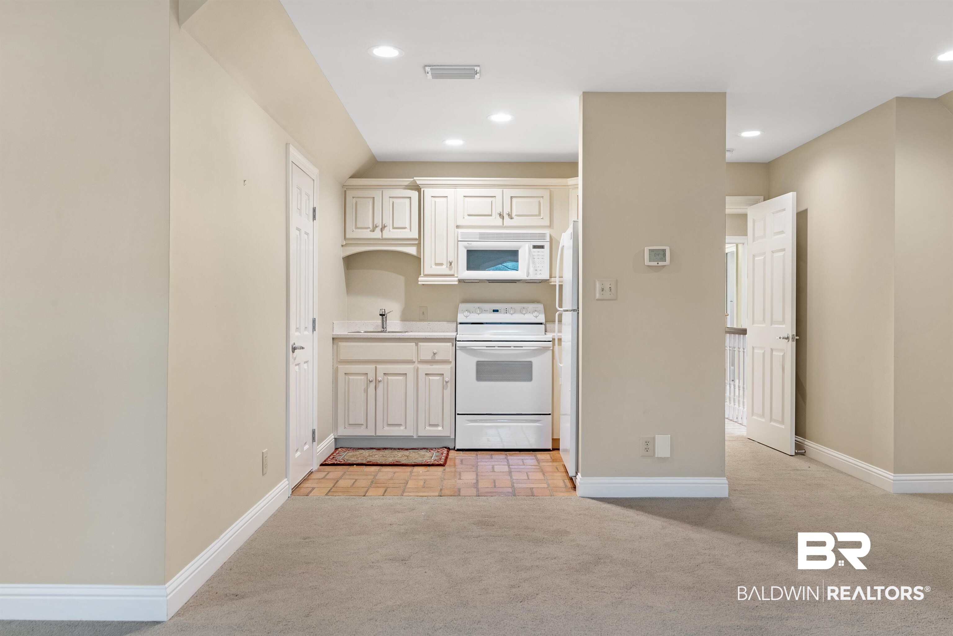 10708 Highway 98 Fairhope, AL 36532 - Photo 26 of 44 Rec Room Kitchen