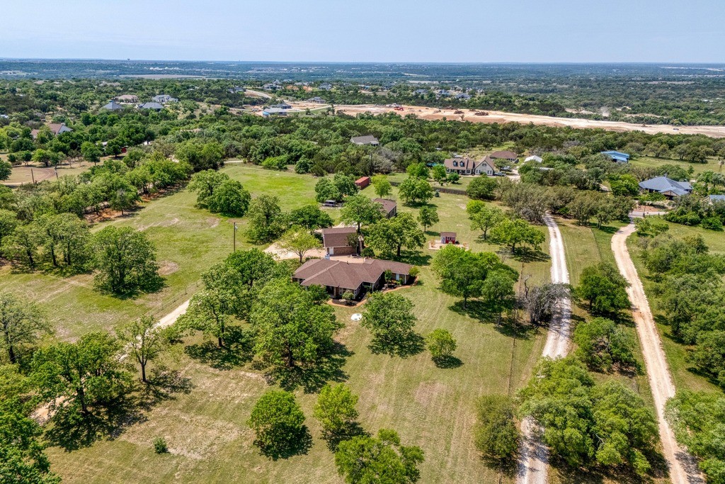 201 Young Ranch Road Georgetown, TX 78633 - Photo 1 of 1 Beautiful gated 5.2 acres with a primary home and guest quarters. New septics, new roofs, new windows!