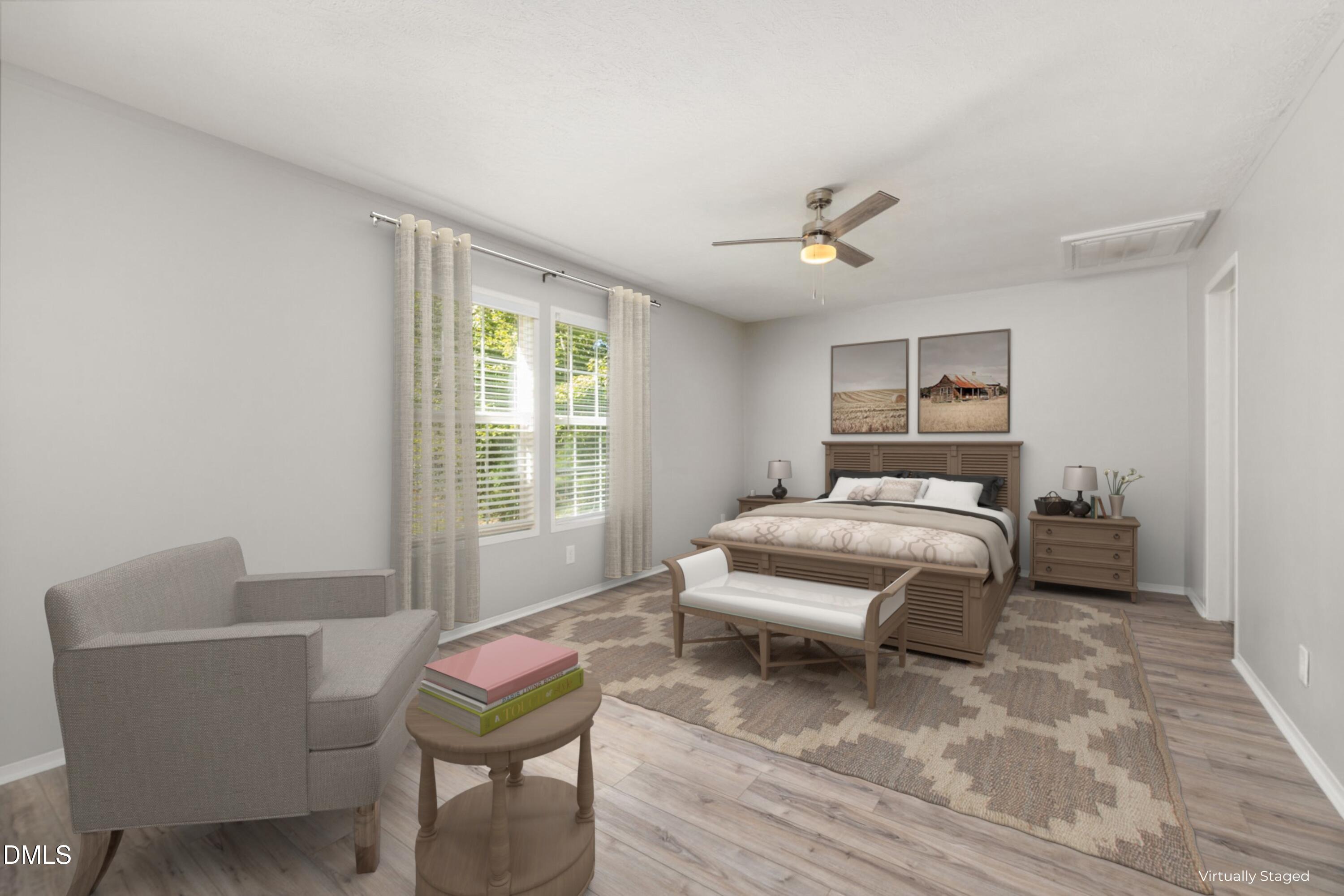 4073 Pine Ridge Road Franklinton, NC 27525 - Photo 14 of 24 a bedroom with a bed and a chair