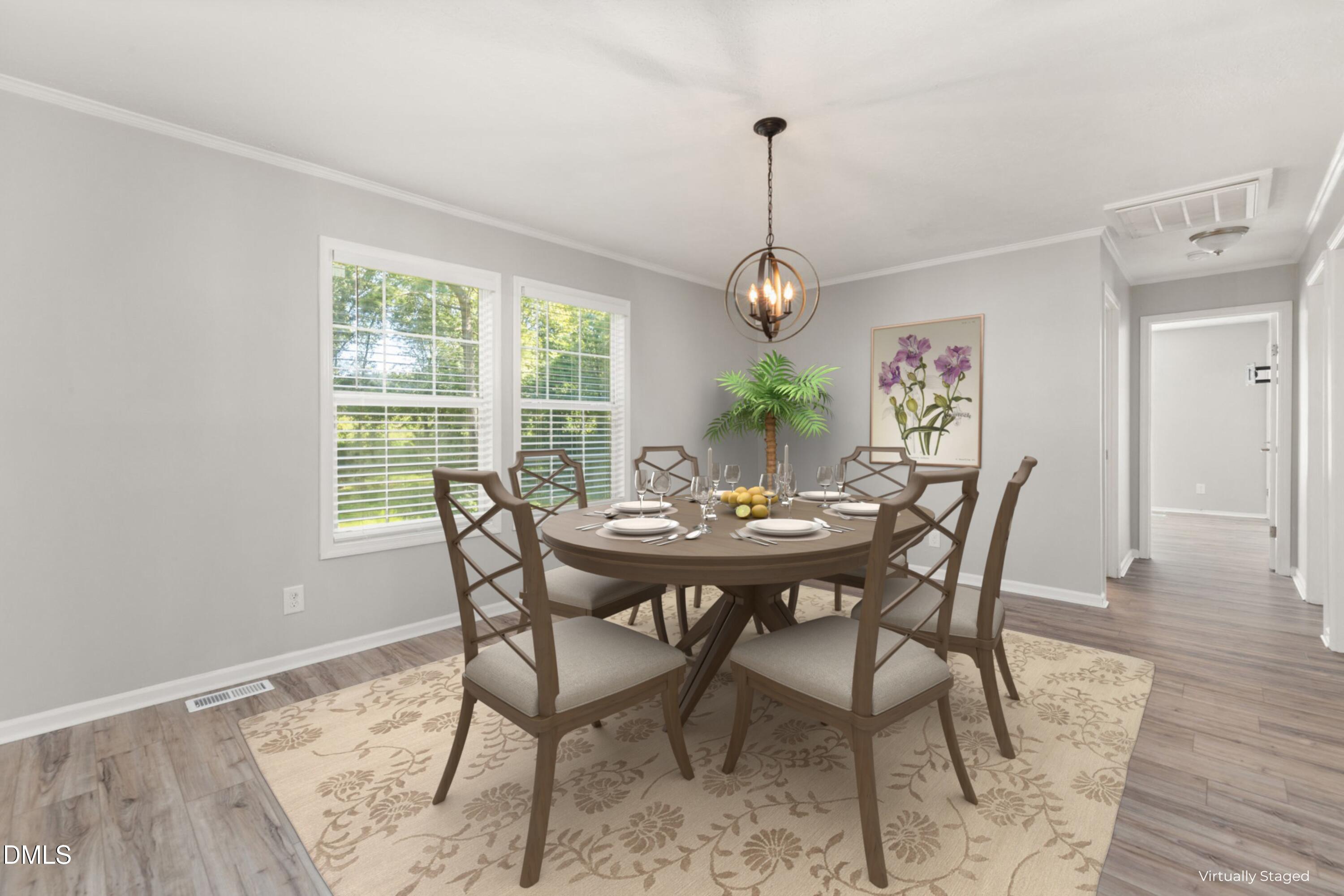 4073 Pine Ridge Road Franklinton, NC 27525 - Photo 8 of 24 a view of a dining room and a table or chairs