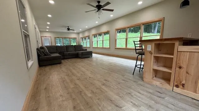 a room with furniture and a wooden floor