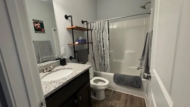 a view of livingroom with closet and cabinet