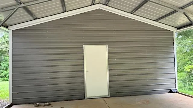 a living room with furniture a flat screen tv and a window