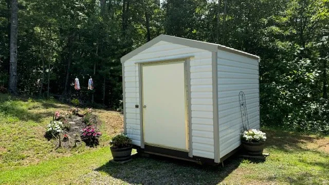a backyard of a house with lots of green space