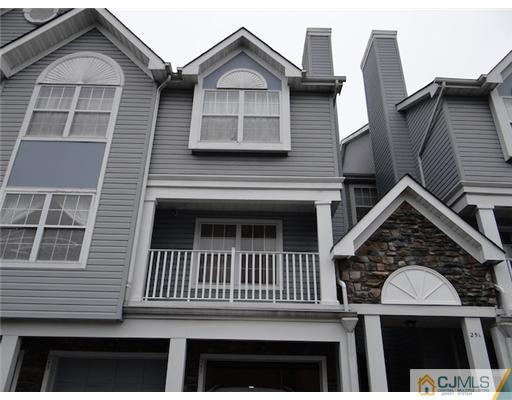 241 Prestwick Way Edison, NJ 08820 - Photo 2 of 9 a view of a brick house with large windows