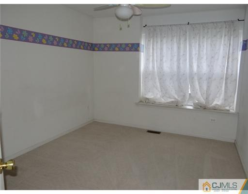 241 Prestwick Way Edison, NJ 08820 - Photo 8 of 9 a view of an empty room