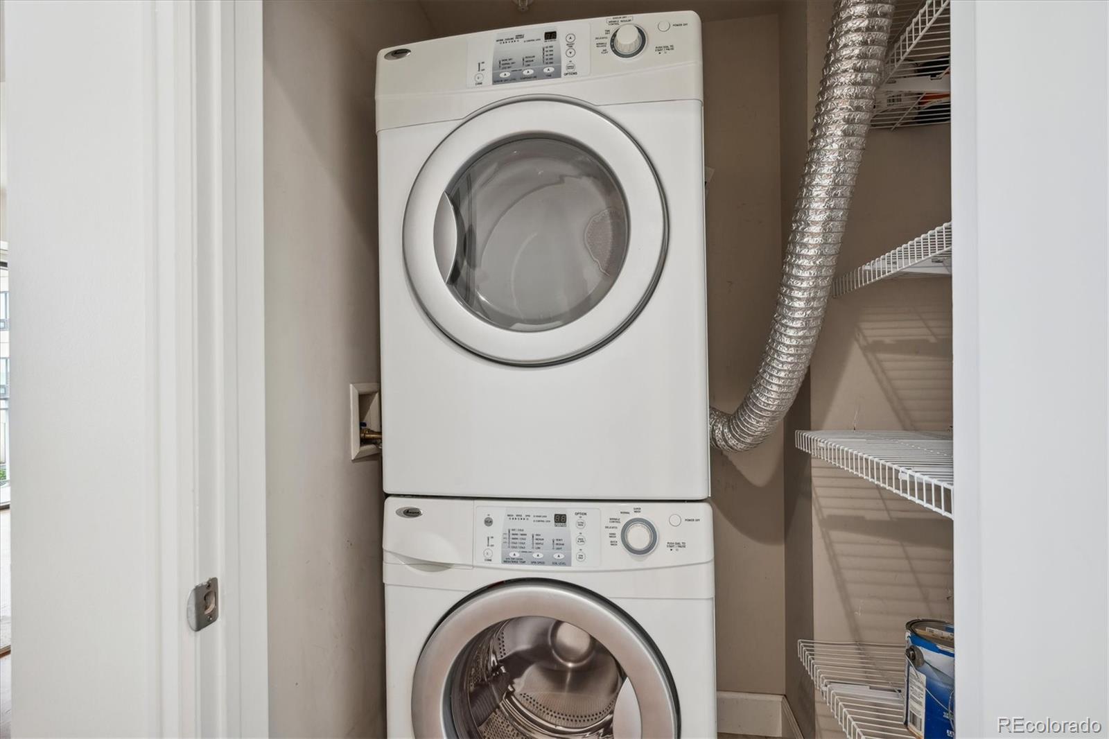 2990 East 17th Avenue, Unit 803 Denver, CO 80206 - Photo 15 of 29 a close up view of a washer and dryer
