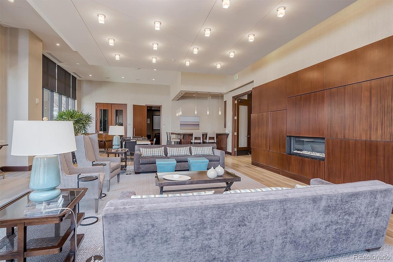 2990 East 17th Avenue, Unit 803 Denver, CO 80206 - Photo 23 of 29 a living room with furniture and a couch