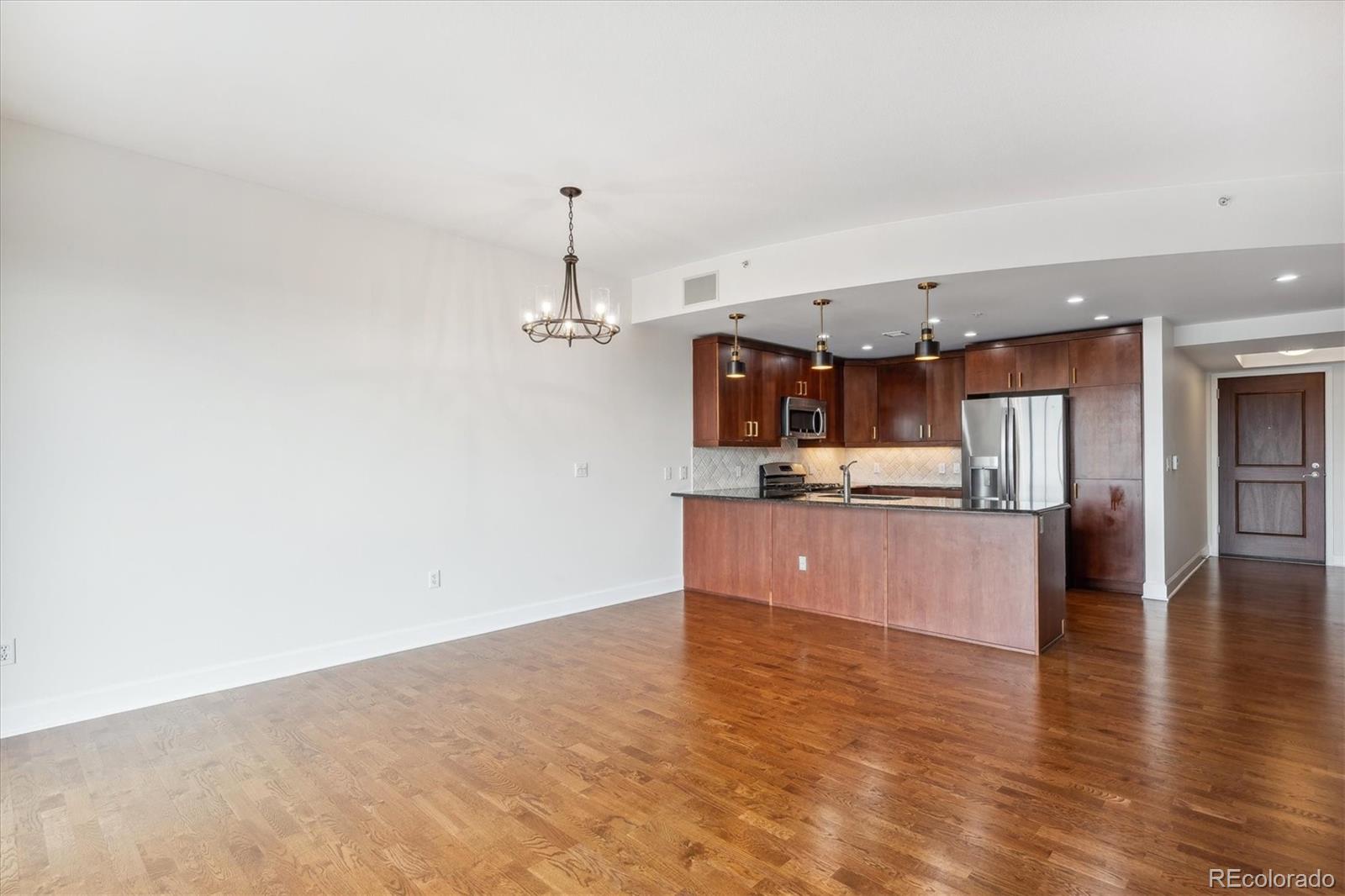 2990 East 17th Avenue, Unit 803 Denver, CO 80206 - Photo 9 of 29 a view of kitchen with cabinets