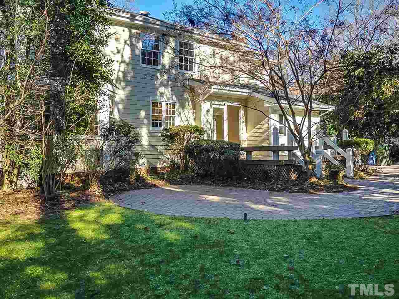 2517 Winterbury Court Raleigh, NC 27607 - Photo 22 of 24 a front view of a house with garden