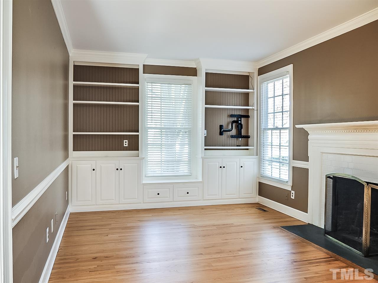 2517 Winterbury Court Raleigh, NC 27607 - Photo 6 of 24 a view of wooden floor and windows in a room