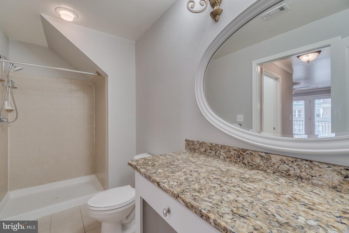 12000 Market Street, Unit 419 Reston, VA 20190 - Photo 21 of 38 Shower in primary bathroom