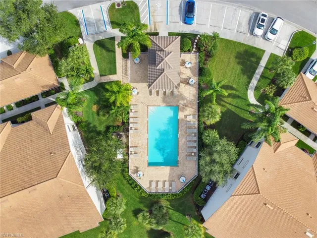 a view of a house with swimming pool