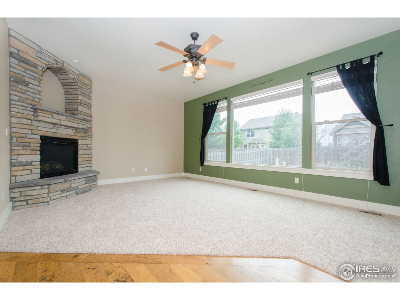7367 McClellan Road Wellington, CO 80549 - Photo 5 of 25 Rock gas fireplace