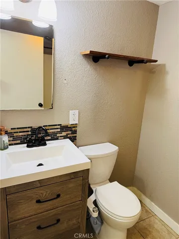 a bathroom with a sink and a toilet