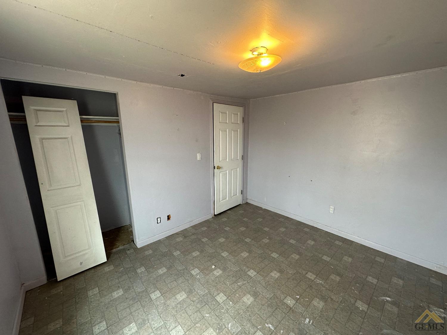 Undisclosed Address Taft, CA 93268 - Photo 11 of 22 an empty room with a window