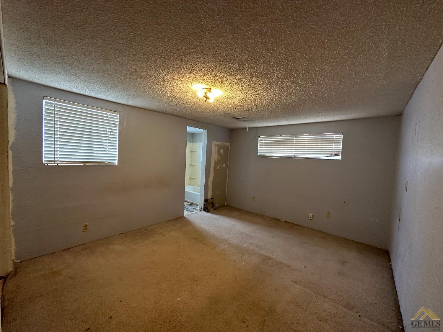 Undisclosed Address Taft, CA 93268 - Photo 15 of 22 a view of an empty room with a window
