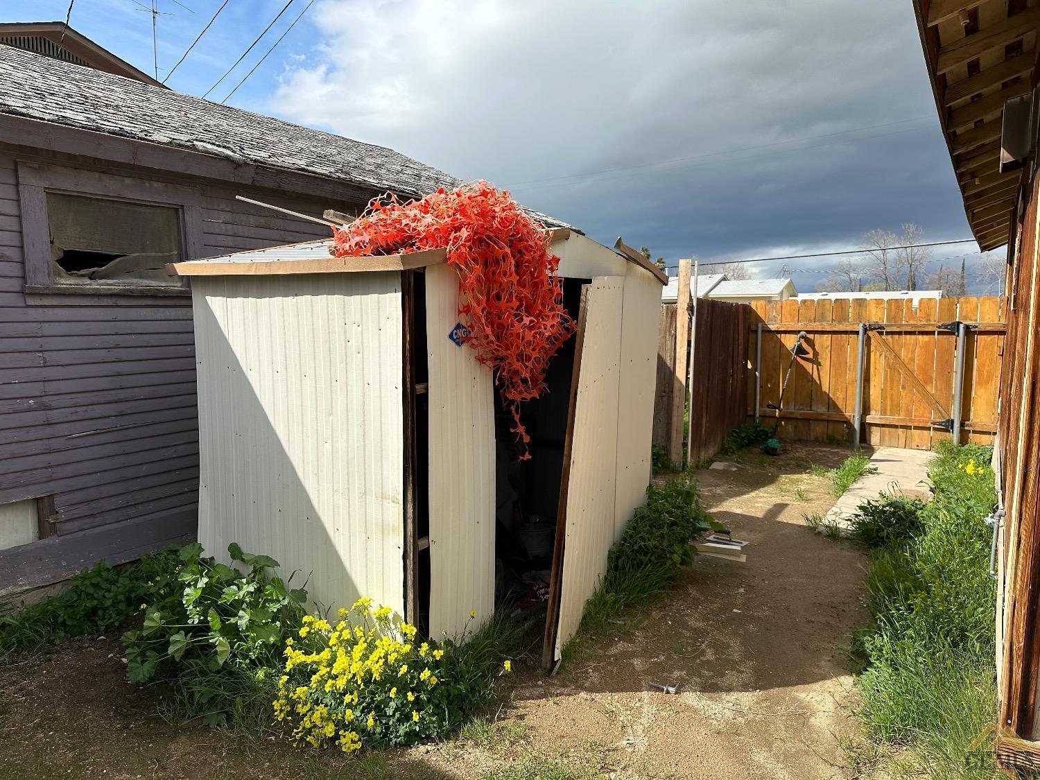Undisclosed Address Taft, CA 93268 - Photo 21 of 22 a view of a house with a yard