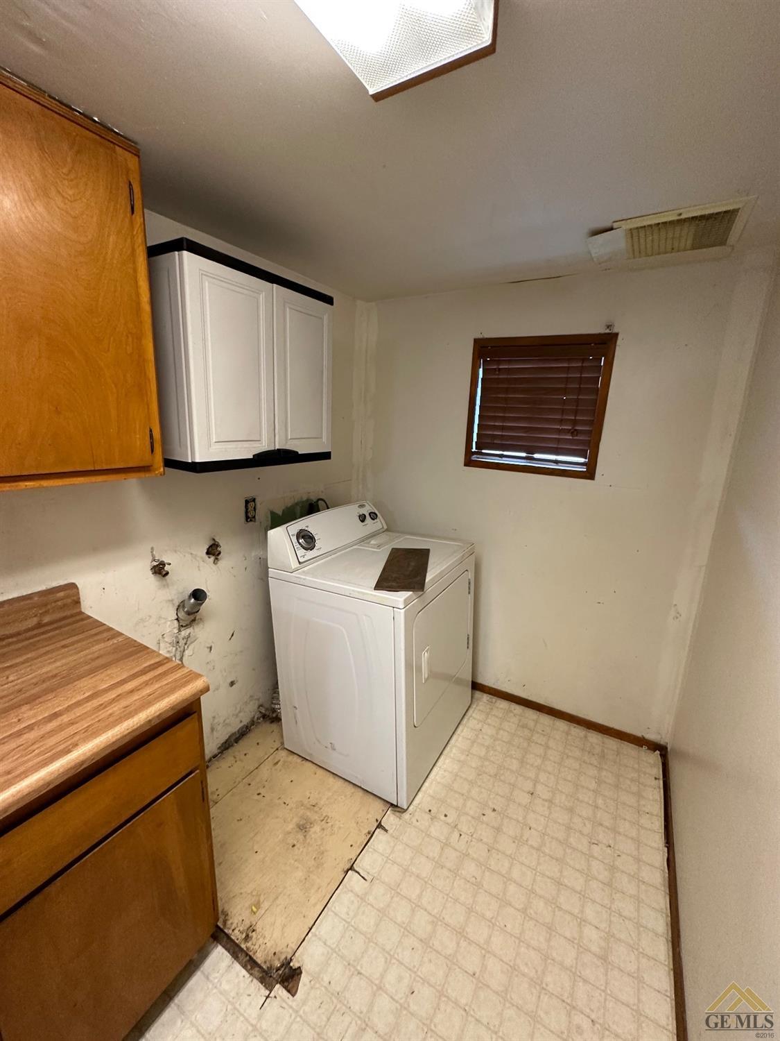 Undisclosed Address Taft, CA 93268 - Photo 5 of 22 a room with storage and utility