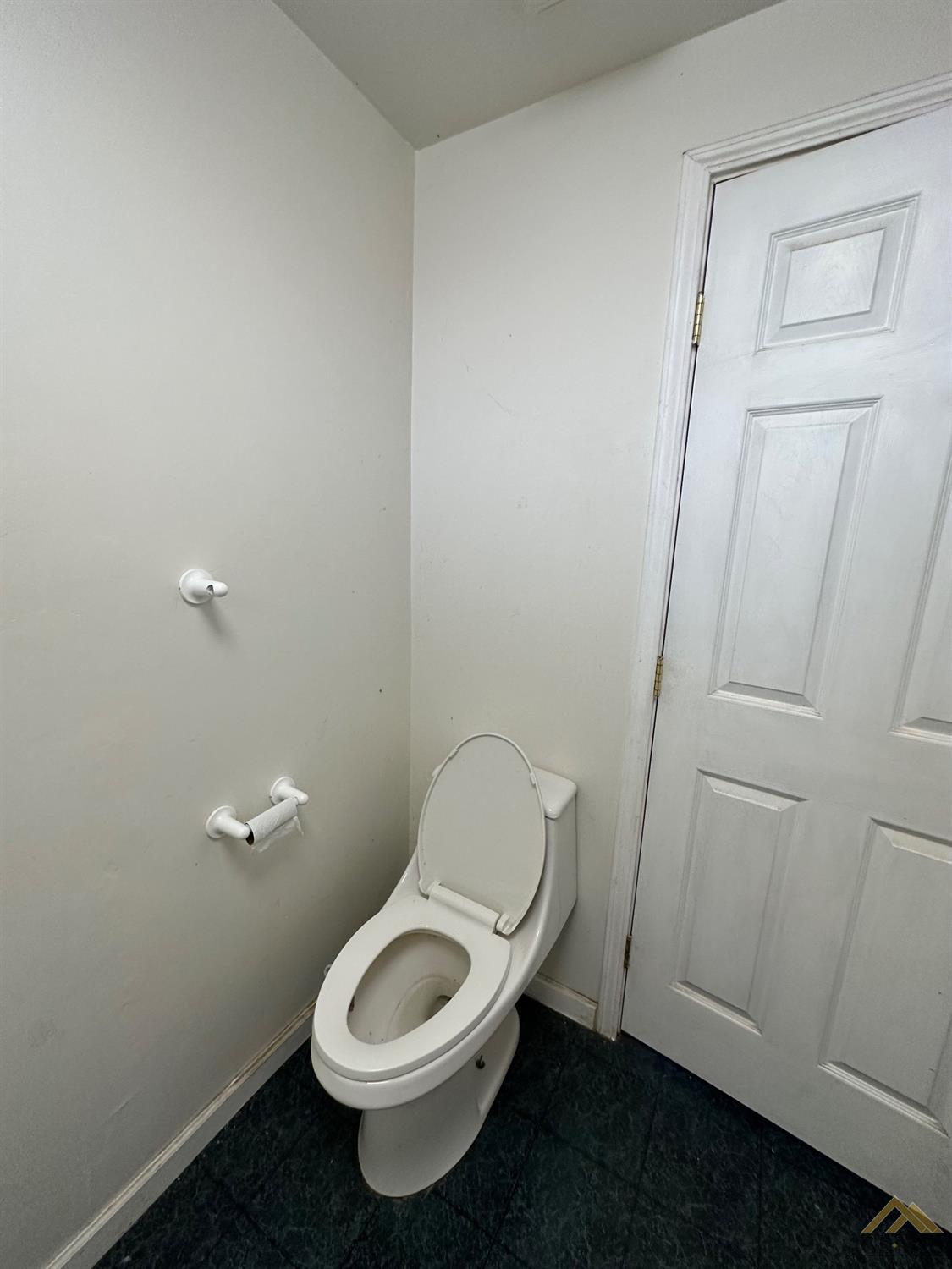 Undisclosed Address Taft, CA 93268 - Photo 9 of 22 a white toilet sitting next to a shower