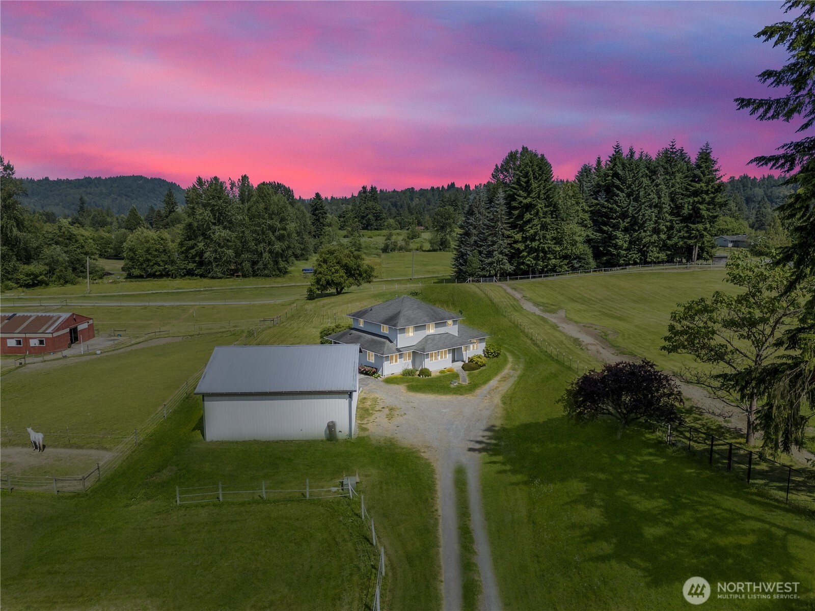 18927 Fales Road Snohomish, WA 98296 - Photo 1 of 18 a view of a lake with a yard