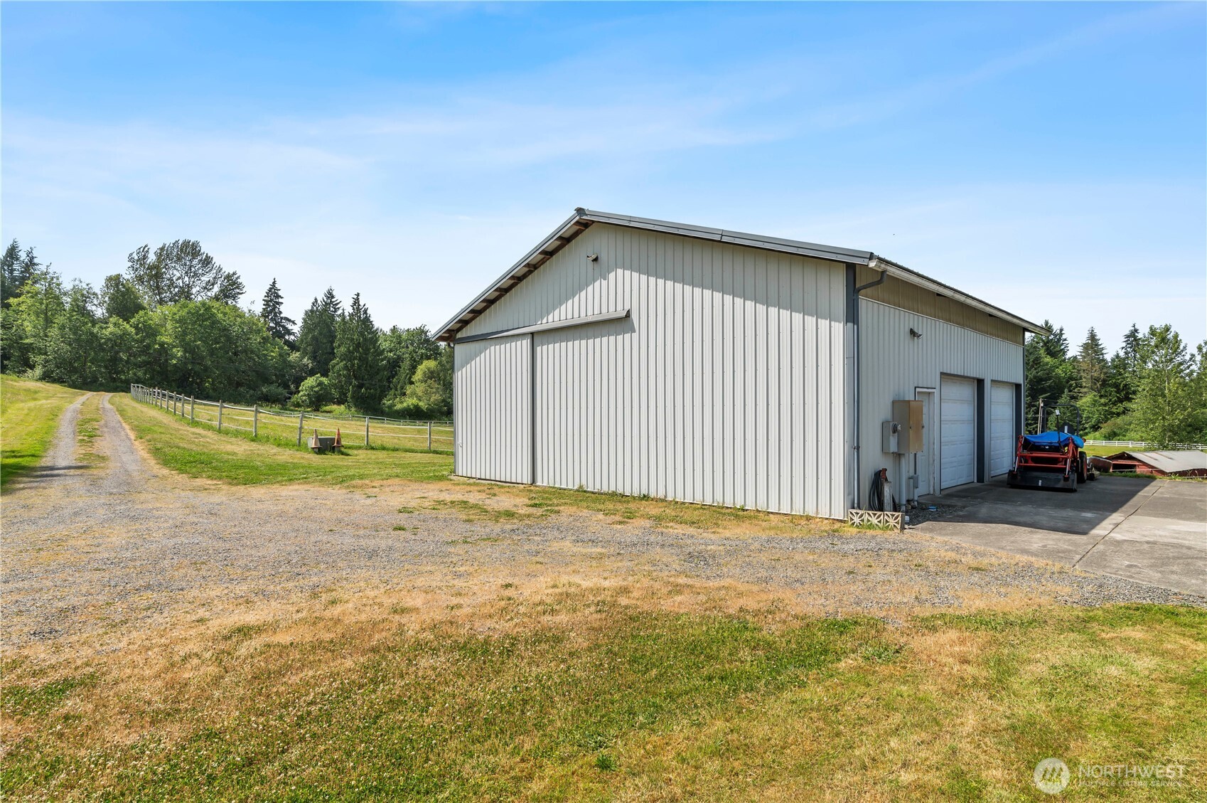 18927 Fales Road Snohomish, WA 98296 - Photo 11 of 18 a view of a house with backyard and trees