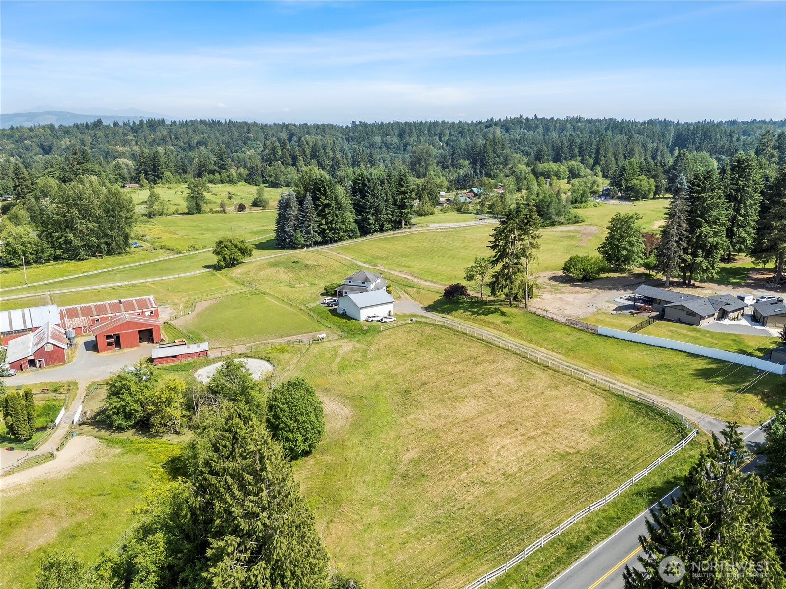 18927 Fales Road Snohomish, WA 98296 - Photo 17 of 18 a view of a swimming pool with a mountain view