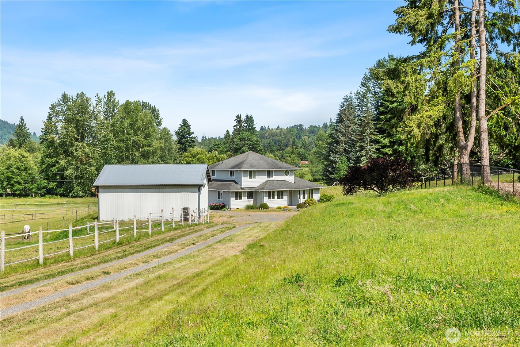 18927 Fales Road Snohomish, WA 98296 - Photo 2 of 18 a view of an house with backyard space and balcony