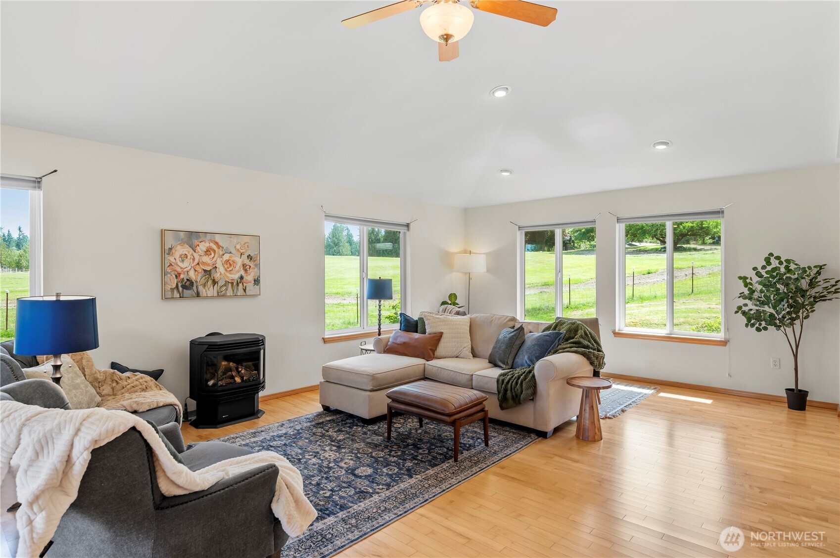18927 Fales Road Snohomish, WA 98296 - Photo 3 of 18 a living room with furniture and a fireplace